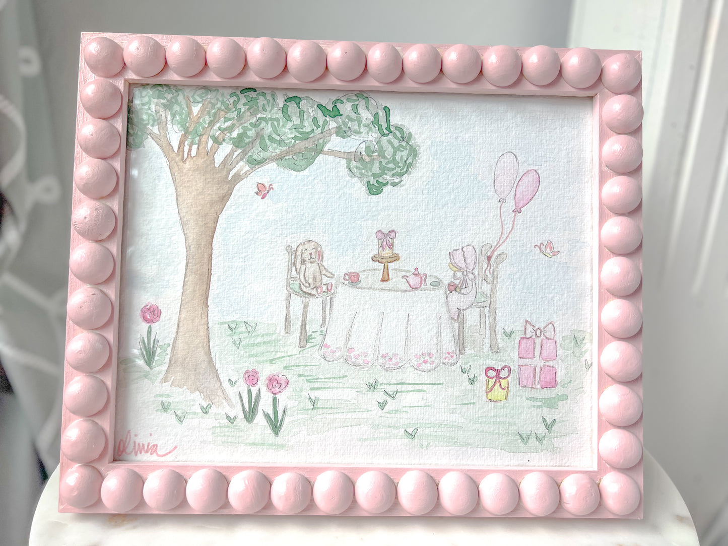 Watercolor Tea Party Framed in Custom Pink Bobbin Frame